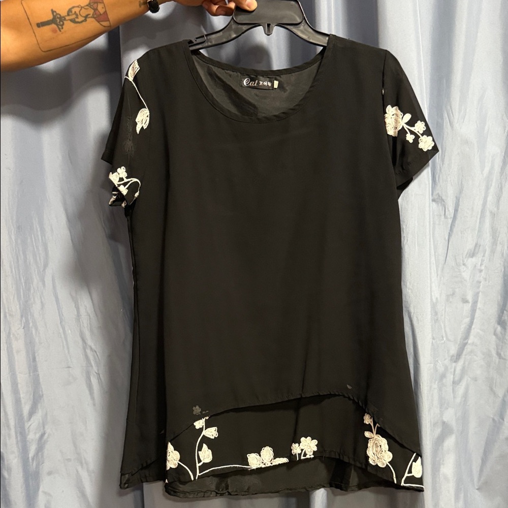 Cato Black Top with White Floral Design